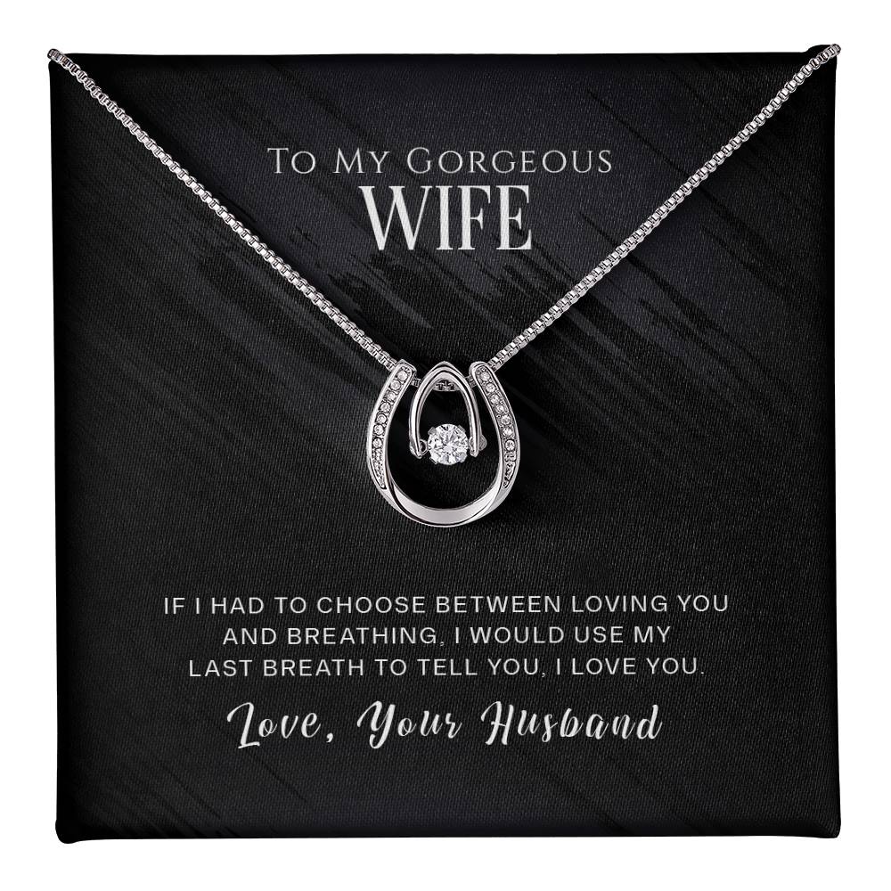 Gift box with a necklace and a loving message for a wife. wife gift for valentine day.