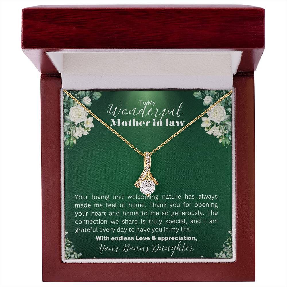 A luxury gift box with a yellow gold necklace and a special message for a beloved mother-in-law.