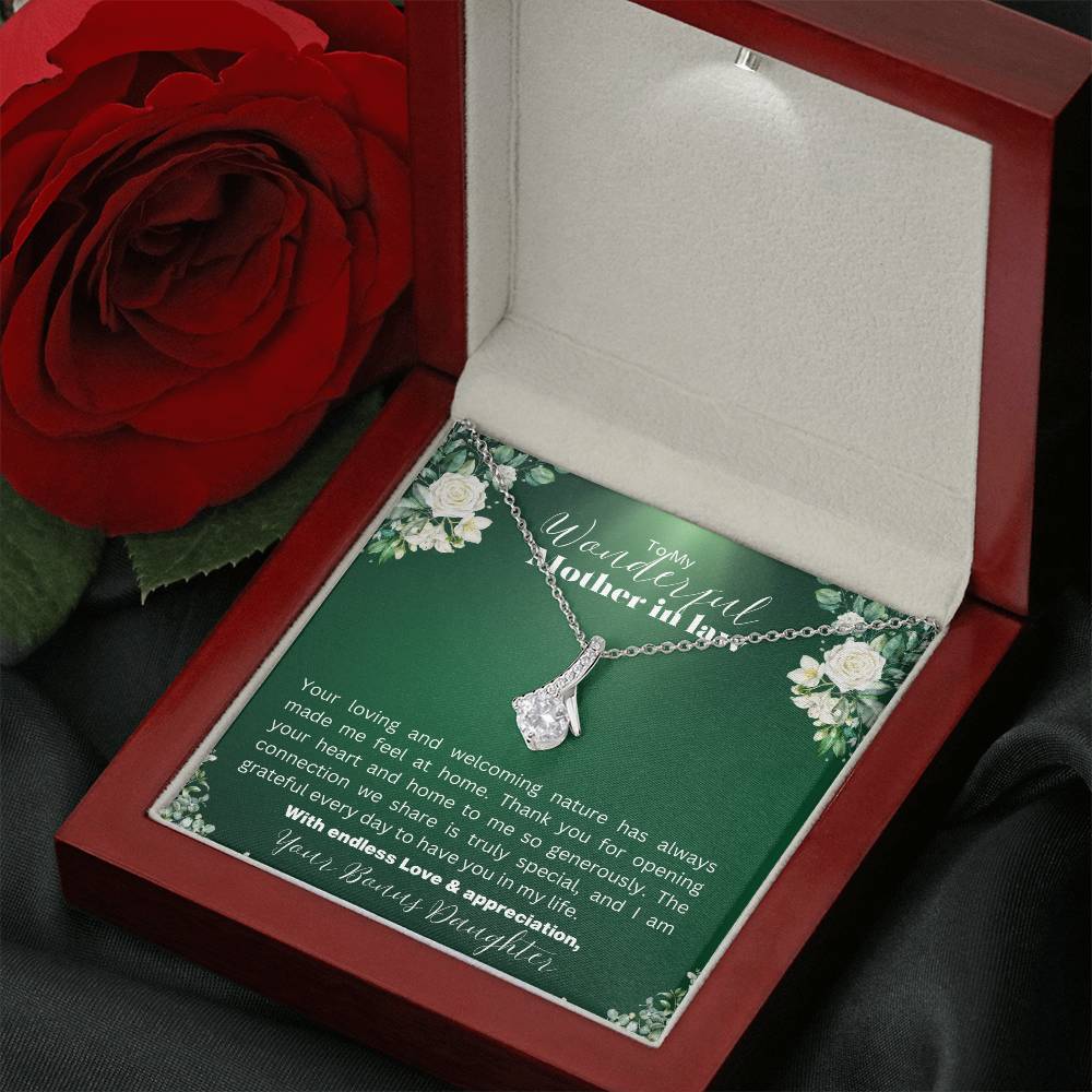 Elegant gift box with a white gold necklace and a heartfelt message for a  mother-in-law  in floral background.