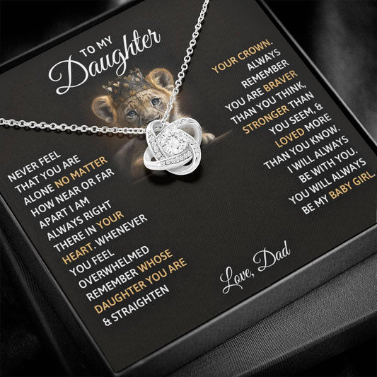 A 14k white gold necklace in a black gift box with a love knot pendant, a heartfelt message to a daughter from her father.