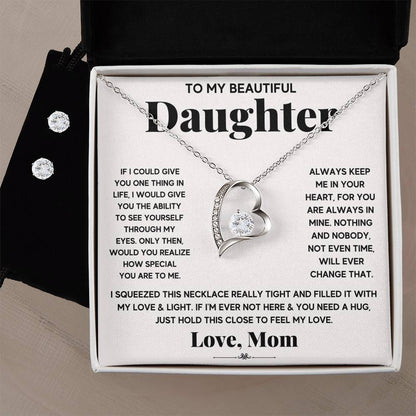 A heartfelt gift: a silver heart necklace with a touching message for a daughter. in white background