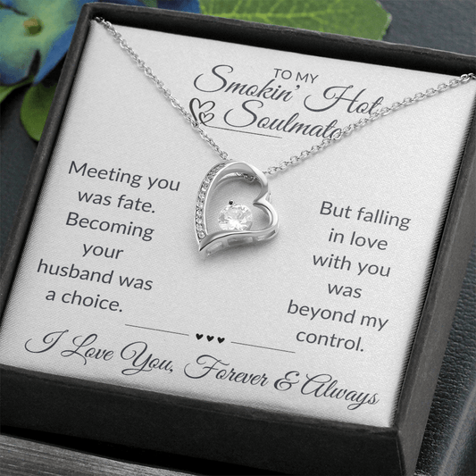 Silver necklace in a heart shape with embedded crystals, packaged with a touching soulmate dedication.