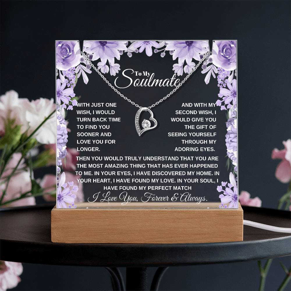 A lit wooden display case acrylic plaque with a purple background and a white gold heart-shaped pendant. The text inside reads, "To My Soulmate" it'a a custom soulmate gift 