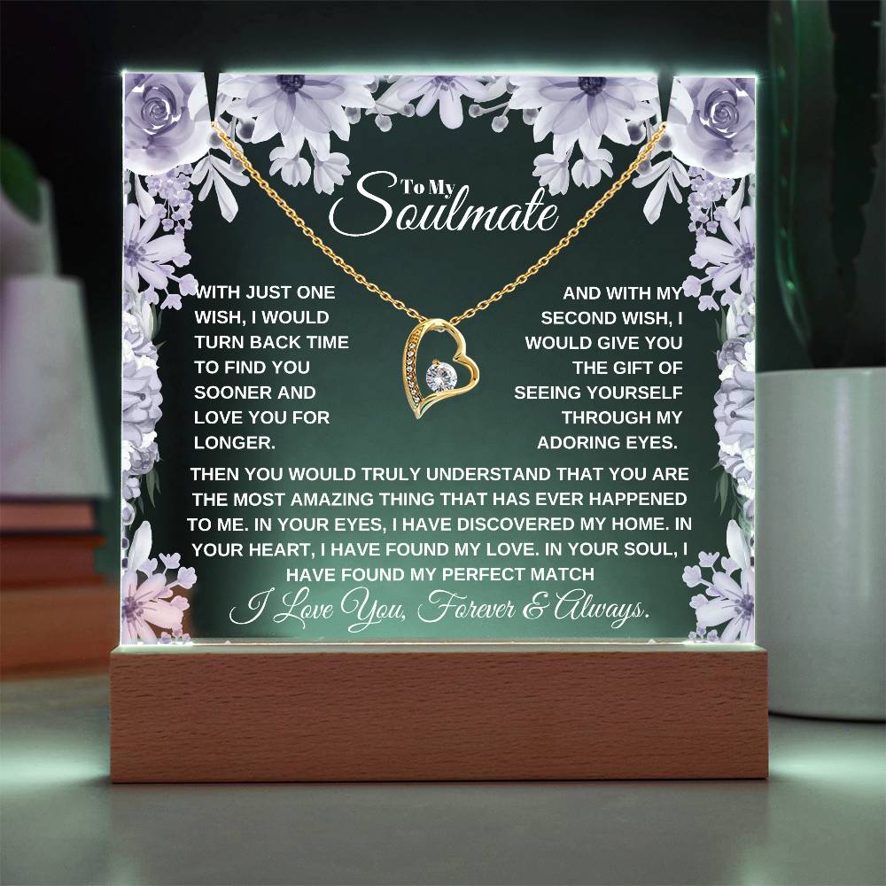 A lit wooden display case acrylic plaque with a heart-shaped pendant lighted up in white The text inside reads, "To My Soulmate" it'a a custom soulmate gift for christmas or birthday